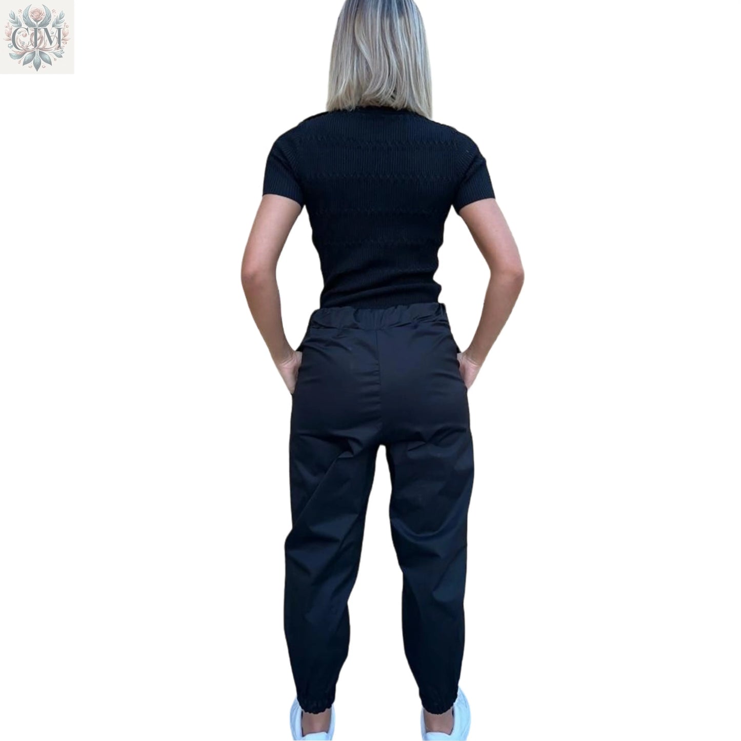 Pantalon noir noeud Élégance décontractée Coton stretch Féminin et chic Silhouette flatteuse Coupe confortable Taille ajustable Black pants Versatile look Casual elegance Modern style Stretch cotton Feminine and chic